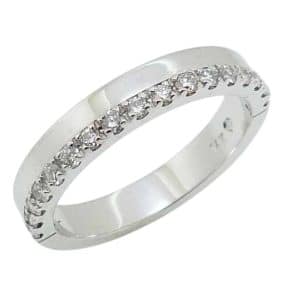 14K White gold band set with seventeen round brilliant cut natural diamonds totaling 0.257 carats, G-H, SI very good cut.