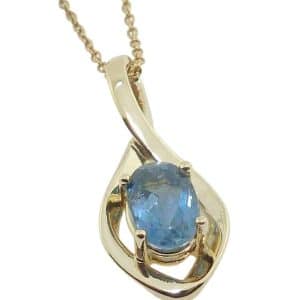 14K Yellow gold pendant claw set with 1.21 carat oval very good quality aquamarine.