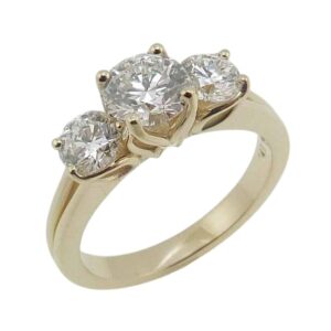 14K Yellow gold three stone engagement ring with petal shape claw set with a 1.01 carat, D, VVS2; a 0.53 carat, D, VVS2; and a 0.53 carat, D, VVS2 all are ideal cut, round brilliant cut lab grown diamonds.