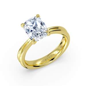 14K Yellow gold Sylvie Jewelry solitaire engagement ring claw set with a 2.52 carat, D, VVS2 elongated cushion modified brilliant cut lab grown diamond.