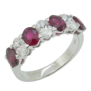 14K White gold lady's band claw set with four oval rubies, 1.38cttw, and three oval brilliant cut diamonds, 0.73cttw.