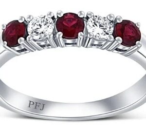 18K White gold lady's band claw set with four rubies, 0.44cttw, and three round brilliant cut diamonds, 0.21cttw.