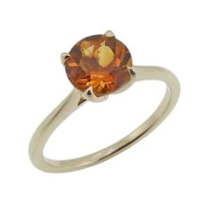 14K Yellow gold solitaire ring claw set with a 1.13 carat round citrine.