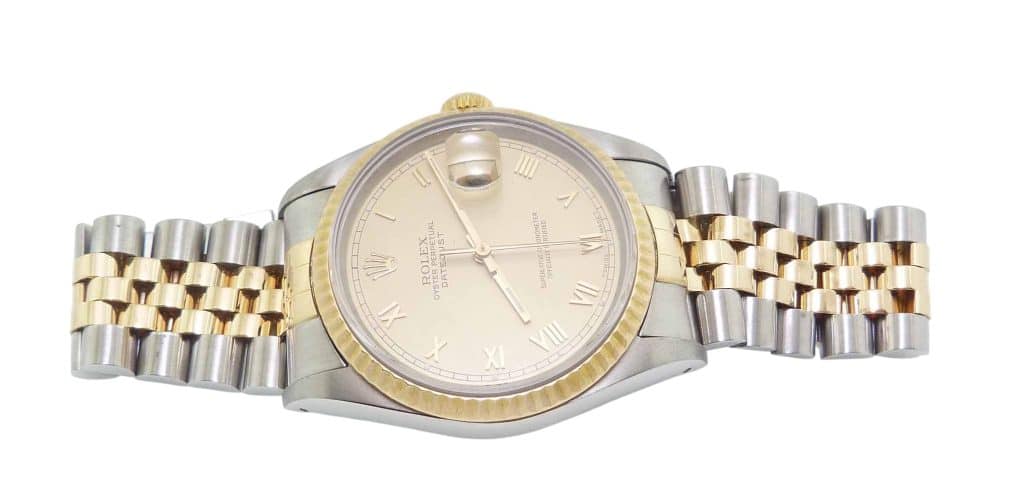 Estate item -1993 Rolex 36mm datejust with 18K Jubilee bracelet, champagne face with roman numerals. 1993 model fully reconditioned and cleaned model#16233 serial#5381740. Has box (in poor condition) with paperwork including original bill of sale.
