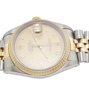 Estate item -1993 Rolex 36mm datejust with 18K Jubilee bracelet, champagne face with roman numerals. 1993 model fully reconditioned and cleaned model#16233 serial#5381740. Has box (in poor condition) with paperwork including original bill of sale.