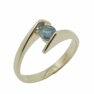 14K Yellow gold bypass style lady's ring channel set with a 0.339 carat Montana sapphire.