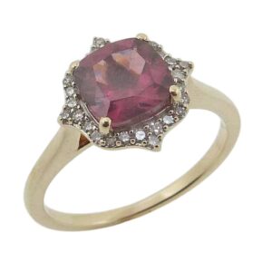 Estate 10K Yellow gold lady's ring set with a 1.92ct rhodolite garnet and accented with 28 natural single cut diamonds, 0.12cttw, H/I, SI2-I1