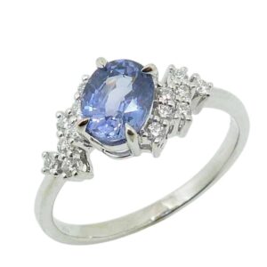 14K White gold lady's ring with a 1.03 carat sapphire and 0.18cttw natural round brilliant cut diamonds.